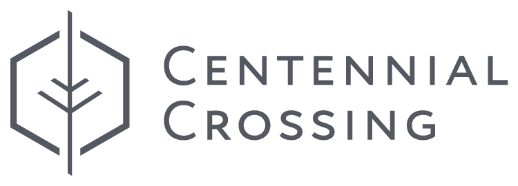 A logo with a hexagonal shape and a plant inside it, next to the words "Centennial Crossing".